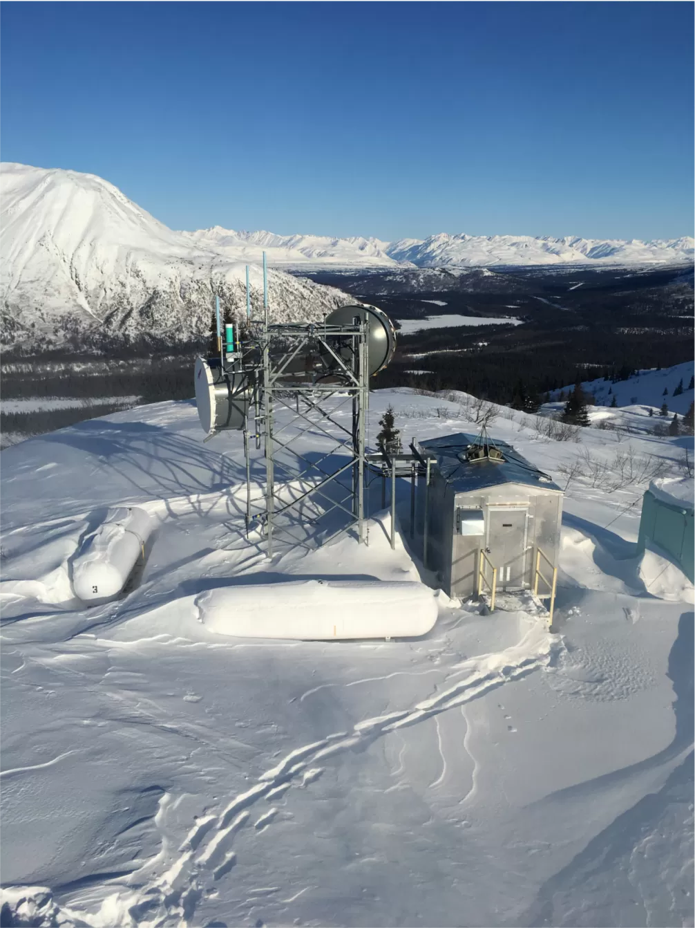 Remote snowy mountaintop telecom site.