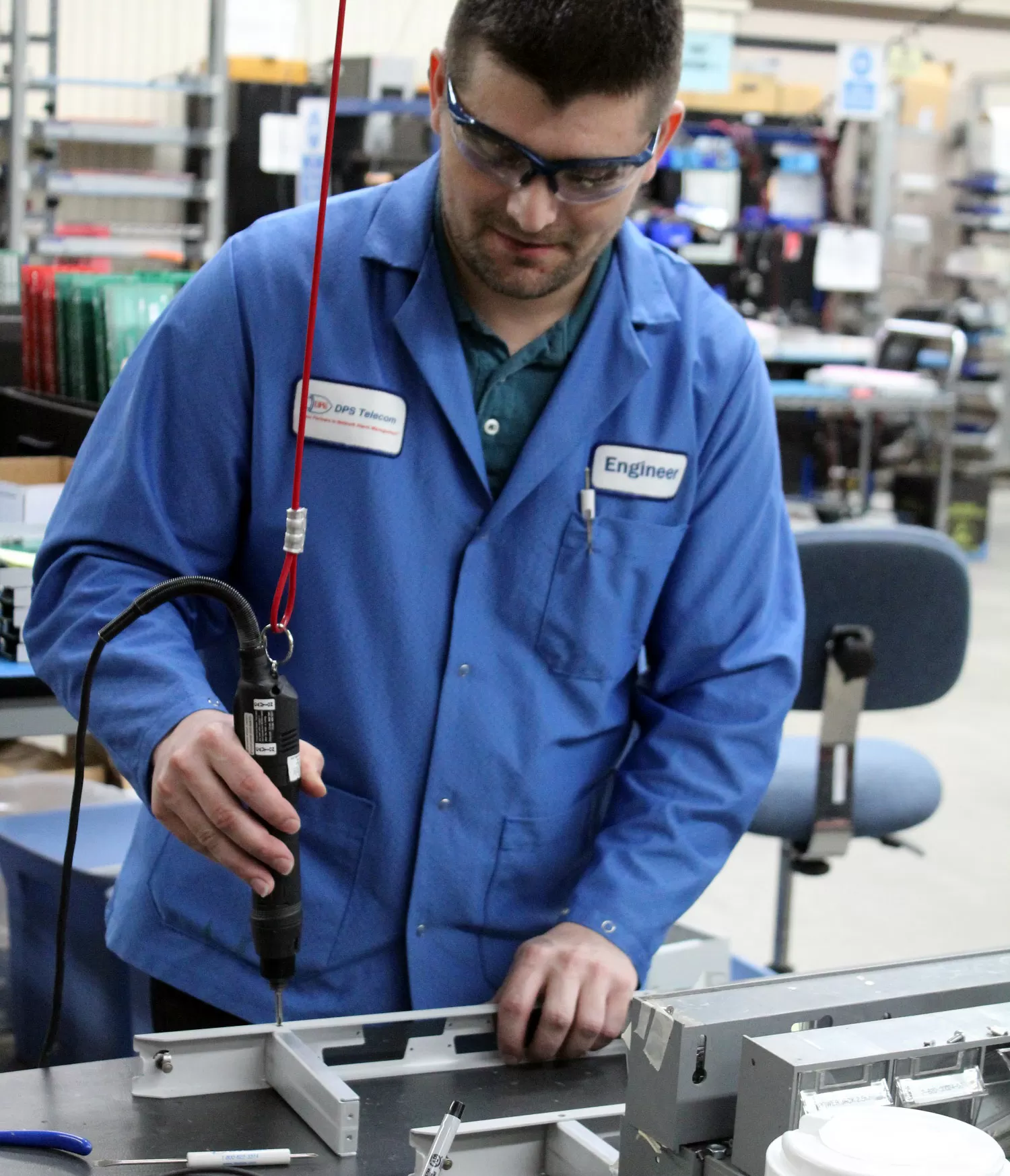 Engineer assembling alarm termination panel