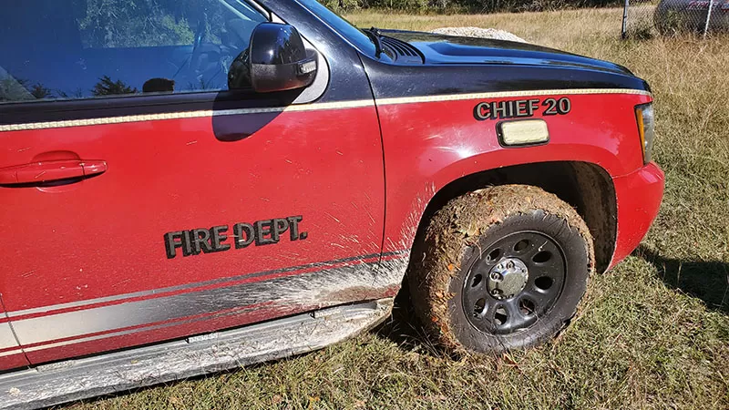 Mud on tires of Fire Chief vehicle