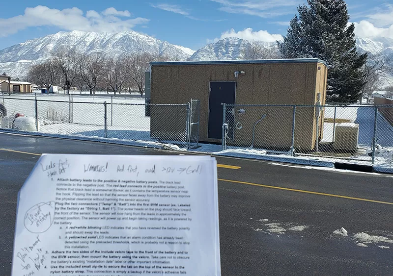 Snow-covered telecom hut with installation SOP or MOP