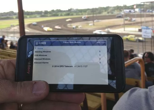 Dickey Rural Networks uses easy T/Mon web browser interface displayed on iPhone screen.
