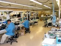 technicians inspecting units